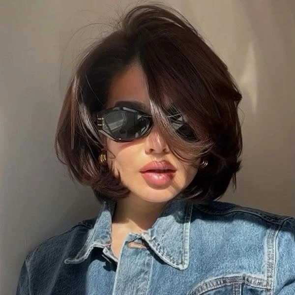 short bobbed hairstyle Voluminous Flipped Bob With Retro Glamour