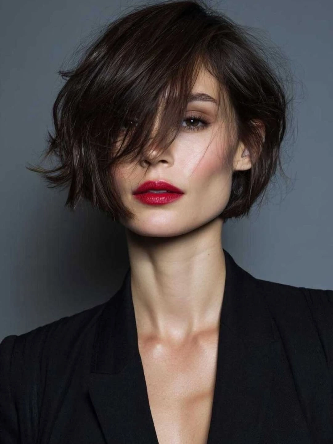 short bobbed hairstyle Tousled Parisian Bob With Long Side Fringe