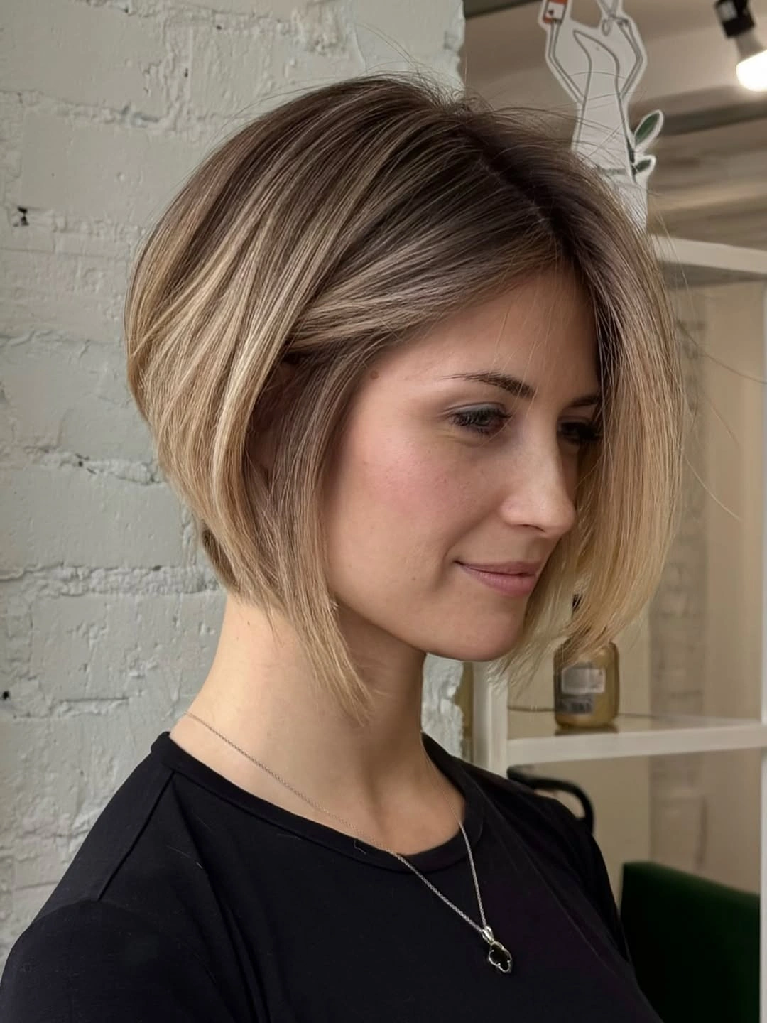 short bobbed hairstyle Classic Angled Blonde Bob With Sleek Dimension