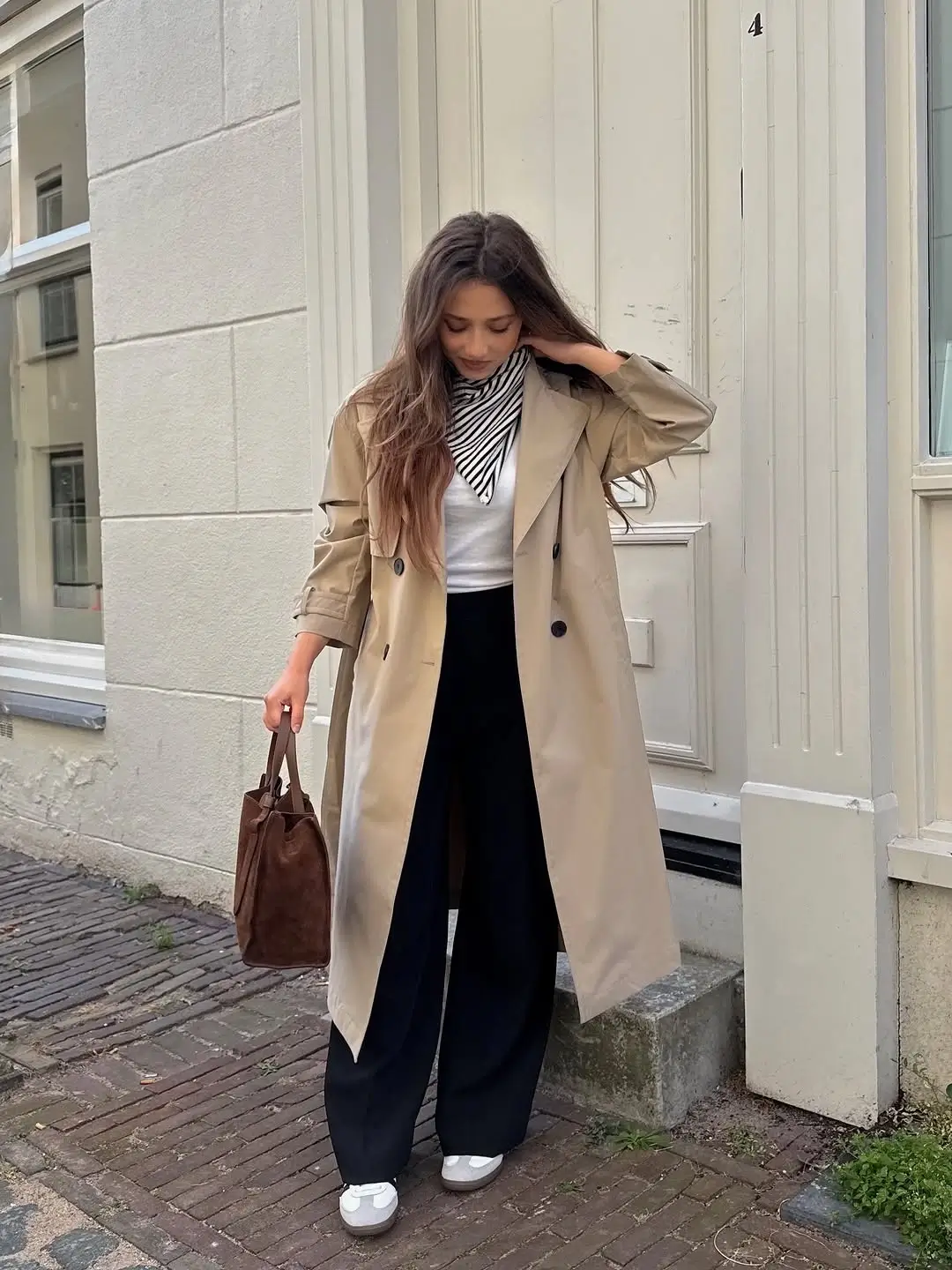 Trench coat fall outfits 2026 A Timeless Beige Trench With Relaxed Tailoring