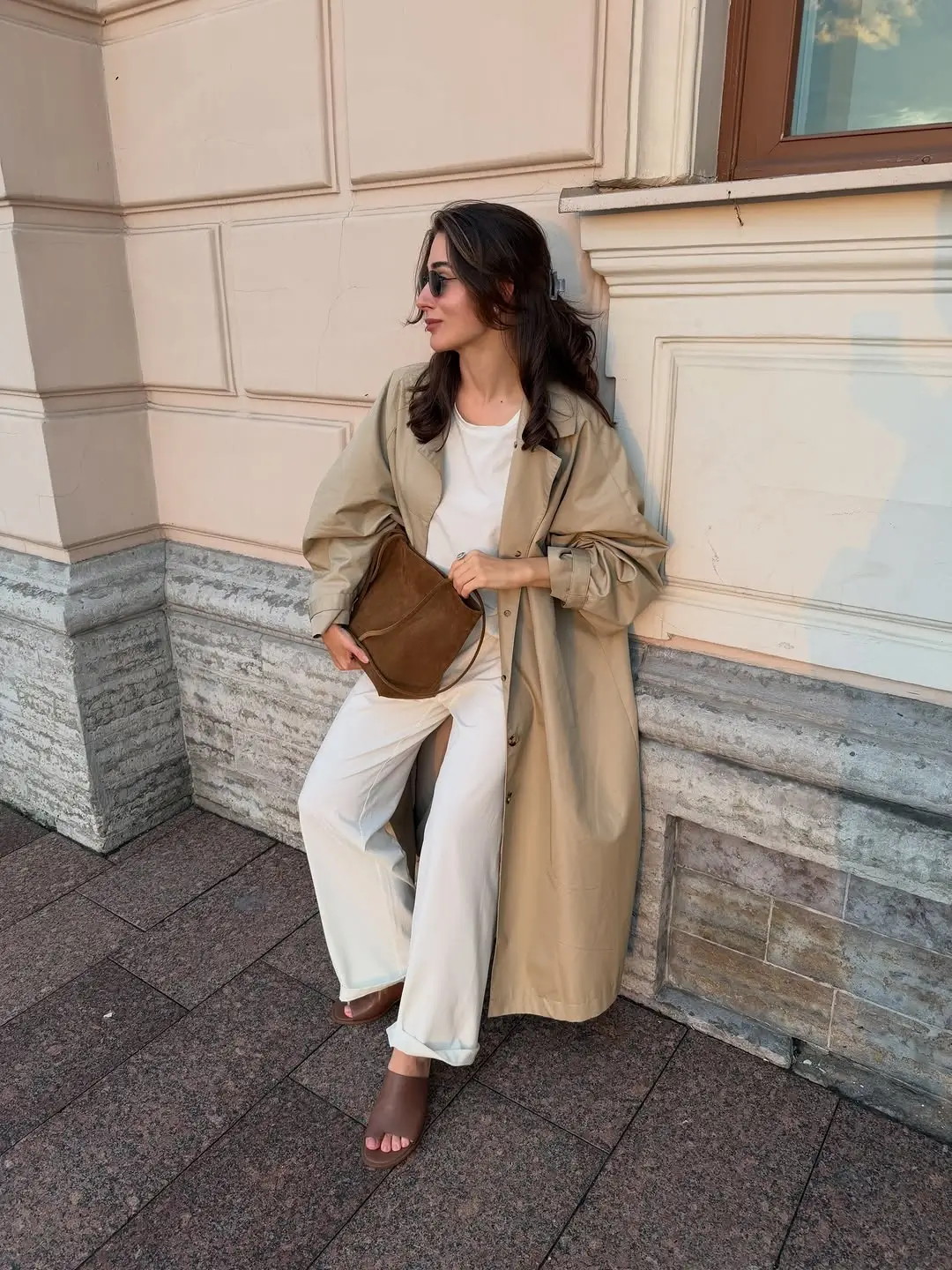 Trench coat fall outfits 2026 Minimal Monochrome Dressing With Warm Camel Accents