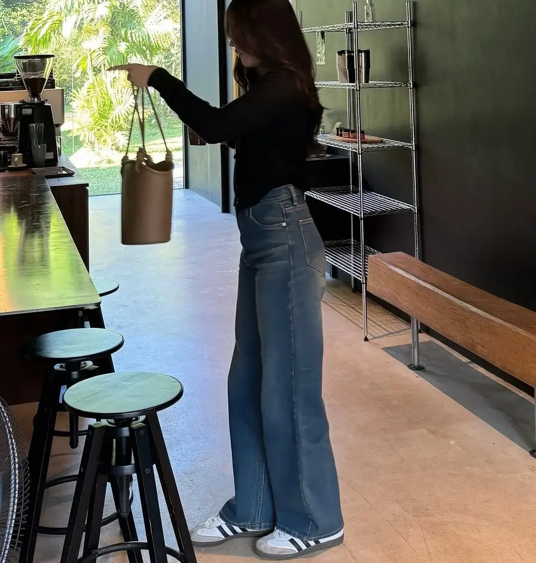 wide leg jeans outfit fall 2026 Sporty Sneakers Meet Relaxed Everyday Denim