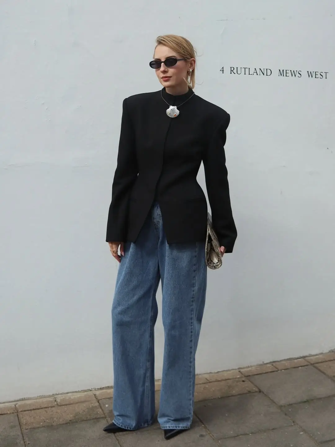 wide leg jeans outfit fall 2026 Sharp Black Tailoring With Relaxed Wide Leg Denim