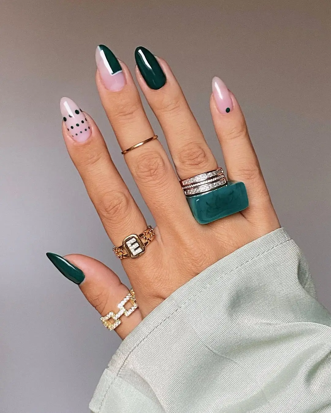 Dark fall nails 2026 Emerald Accent Almond Nails for a Fresh Autumn Twist