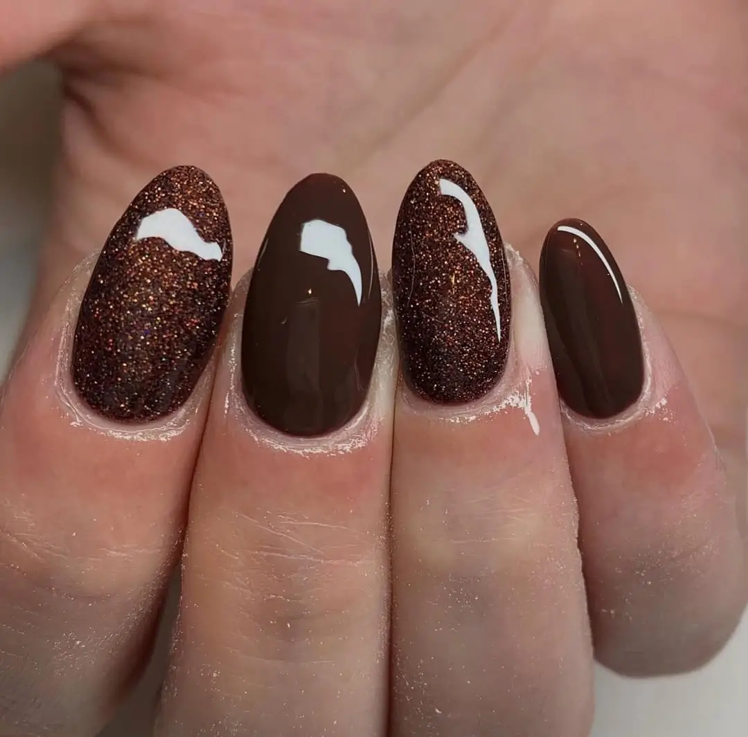 Dark fall nails 2026 Chocolate Shimmer Nails With a Soft Sparkling Finish