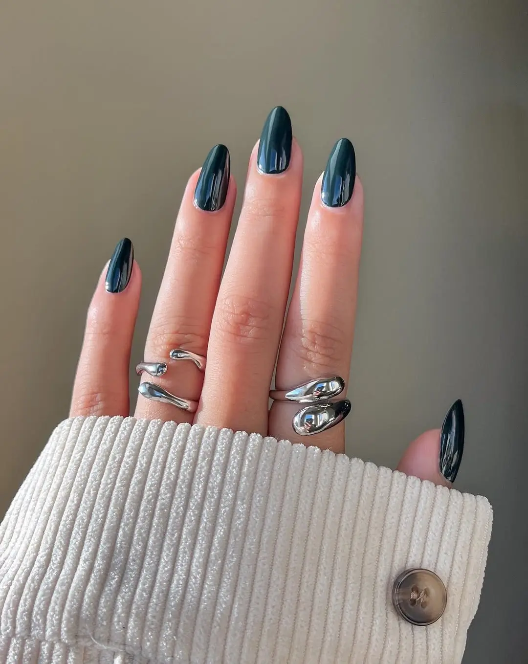 Dark fall nails 2026 Midnight Forest Green Almond Nails With a Mirror Shine