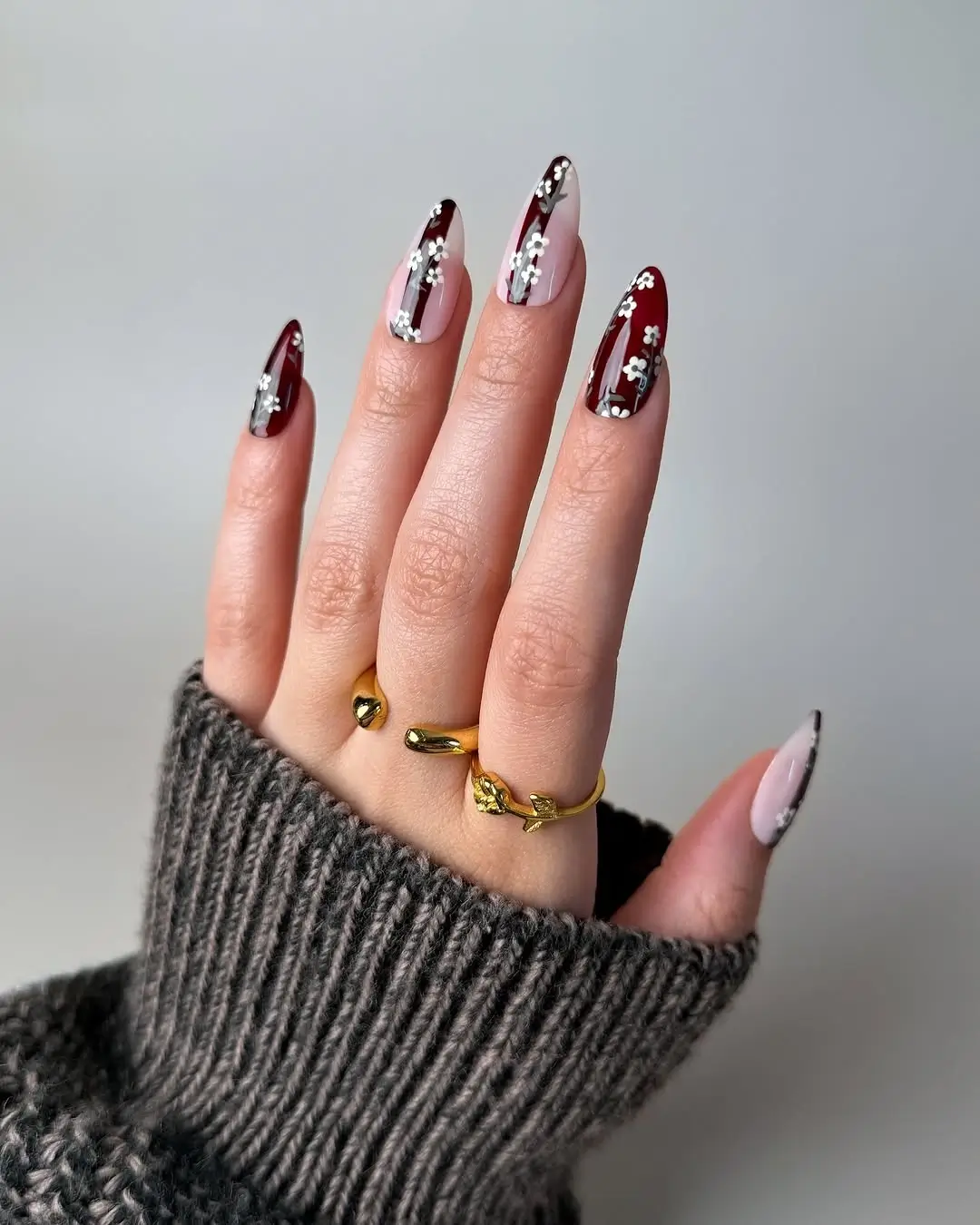 Dark fall nails 2026 Burgundy Floral French Tips With Delicate White Blossoms