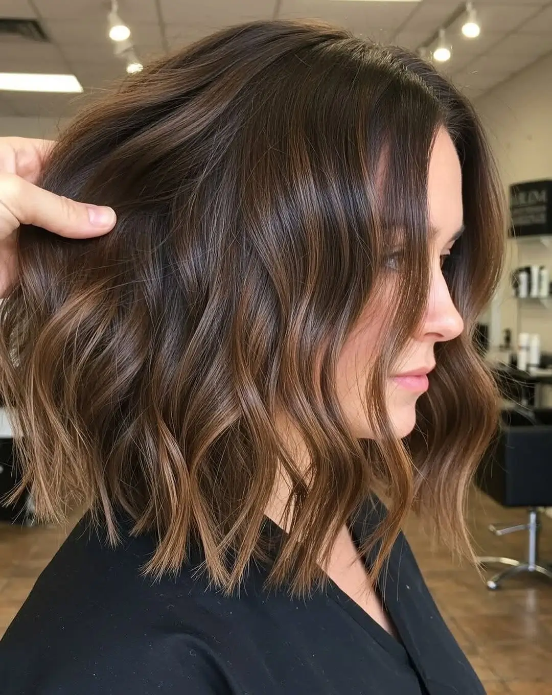 Fall brown hair colour ideas 2026 Textured Chocolate Bob With Subtle Caramel Highlights