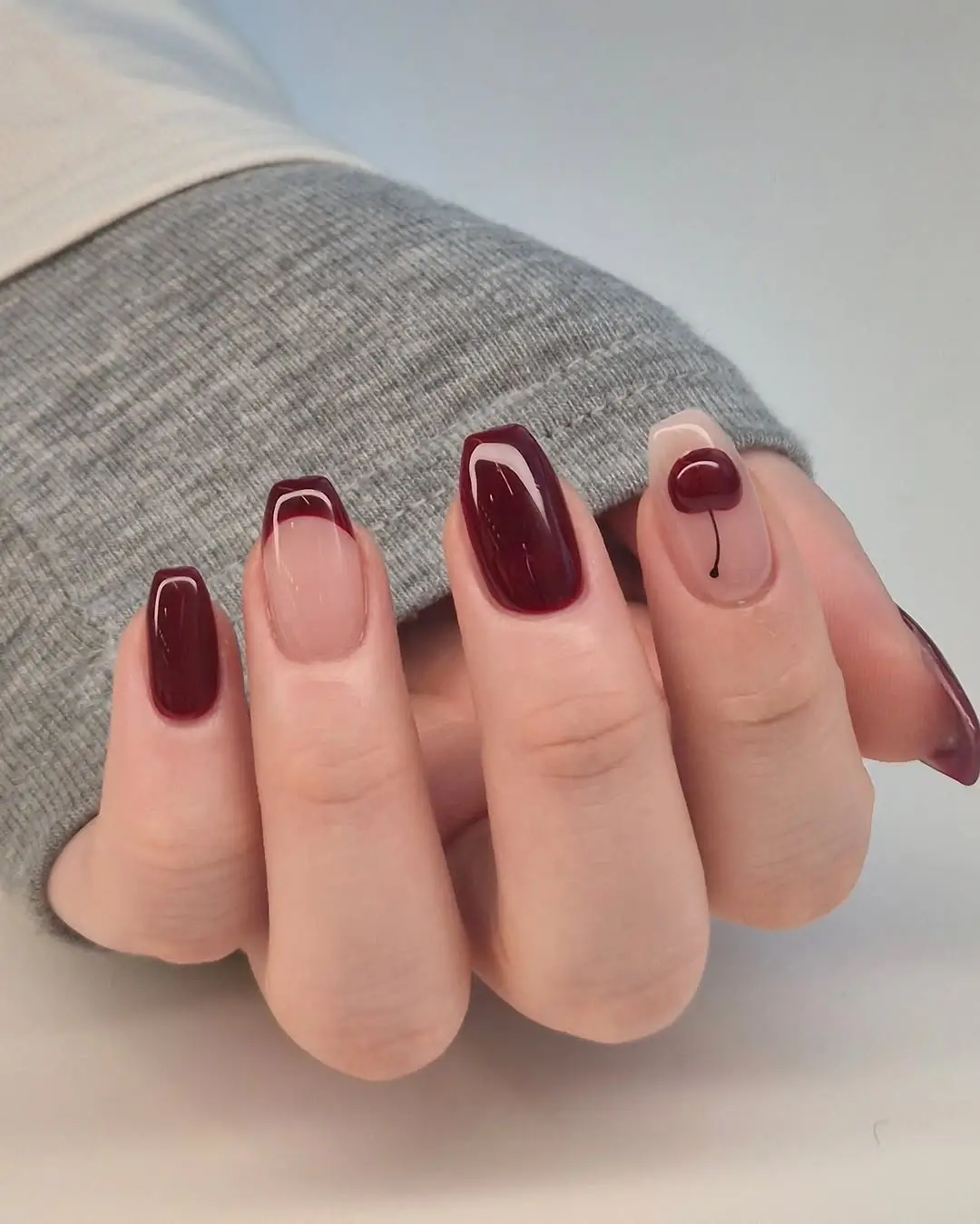 fall burgundy nails with design Short square burgundy French manicure with minimalist details