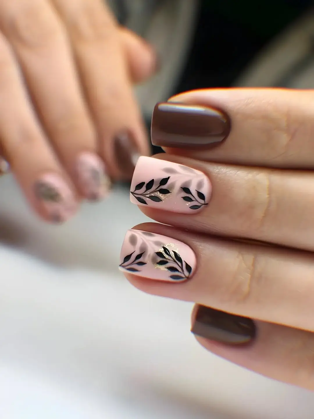 Fall gel nails ideas 2026 Soft Botanical Nails With Chocolate Brown Accents