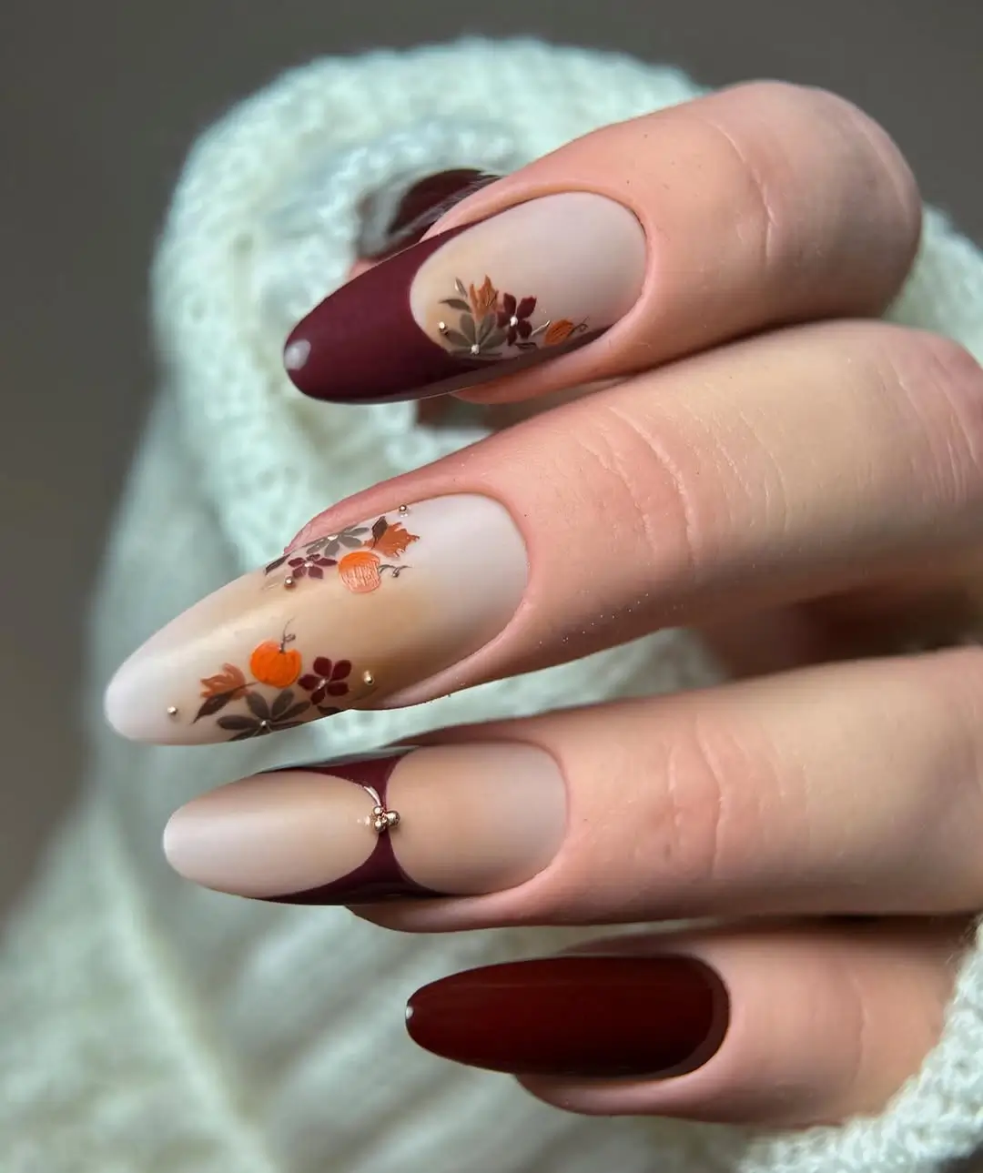 fall long nails 2026 Burgundy French Tips With Tiny Pumpkin and Leaf Art
