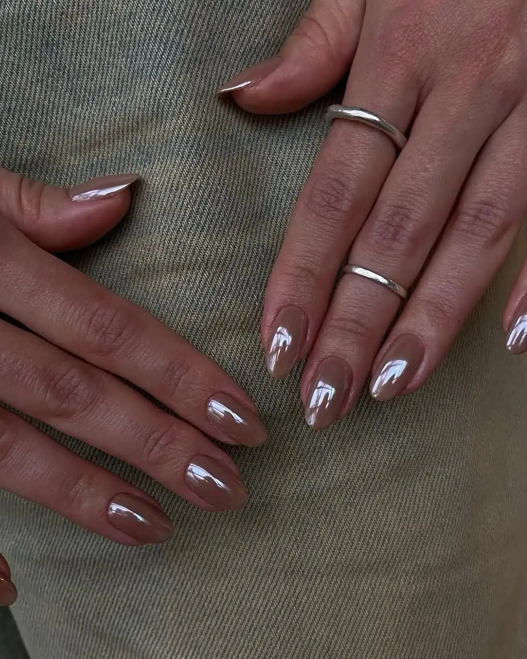 Fall manicure ideas 2026 Glossy Taupe Almond Nails for Everyday Elegance
