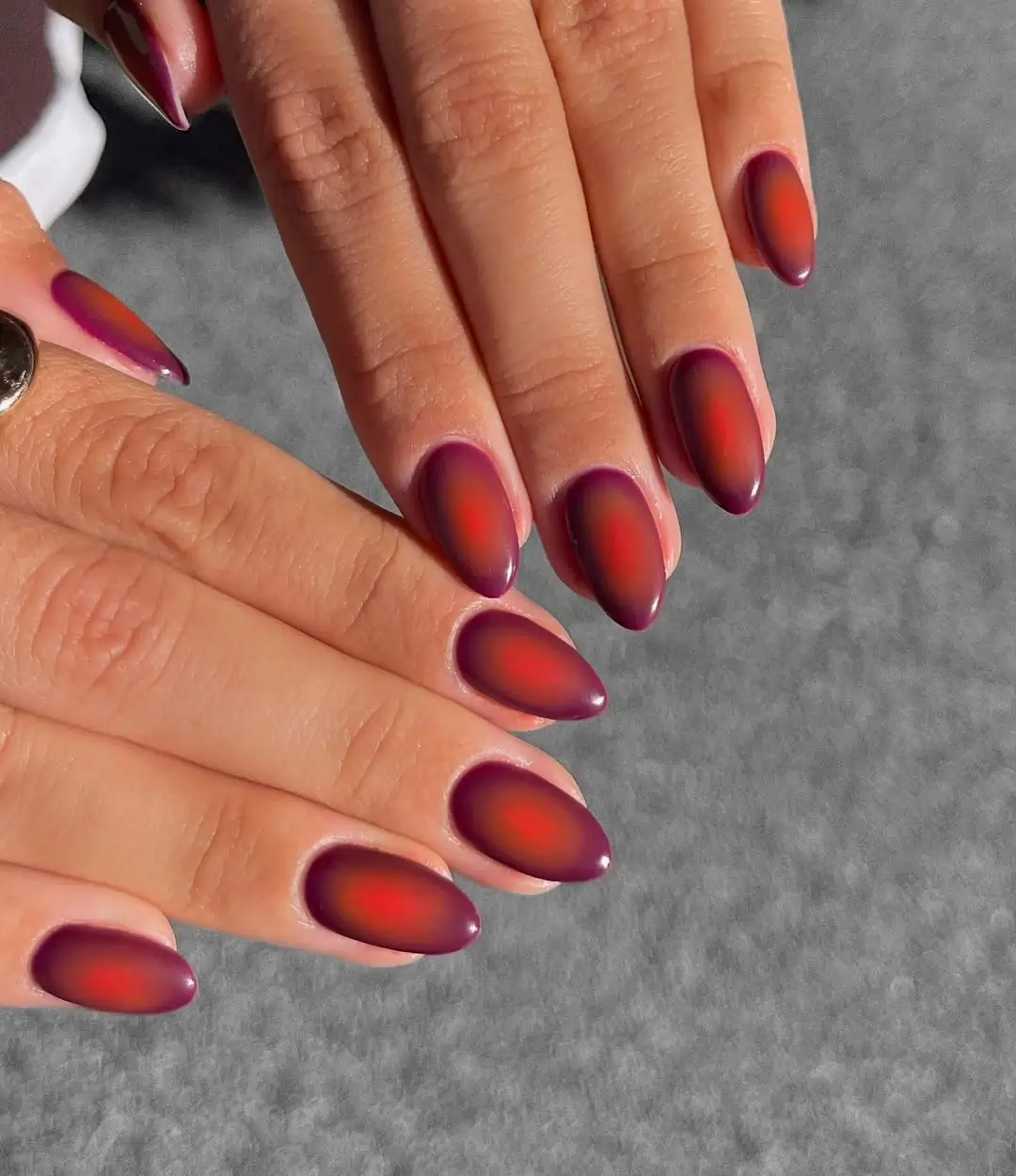 Fall manicure ideas 2026 Matte Sunset Aura Nails in Rich Berry Tones