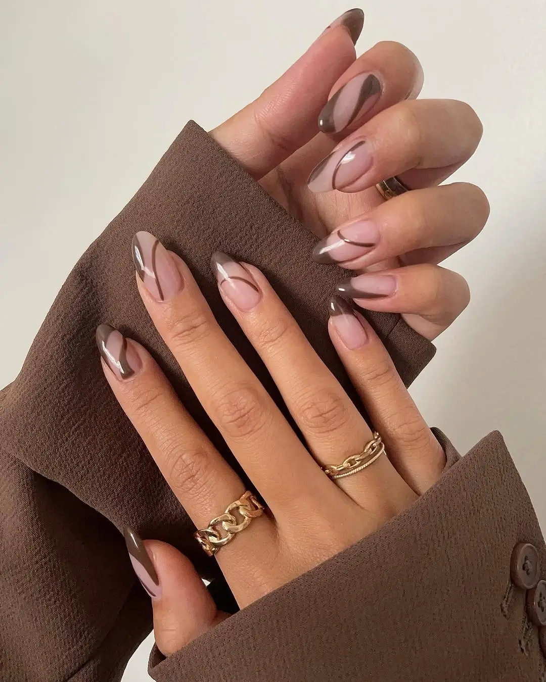 fall nail trends 2026 Minimal Mocha Abstract Nails with Soft Brown Curves