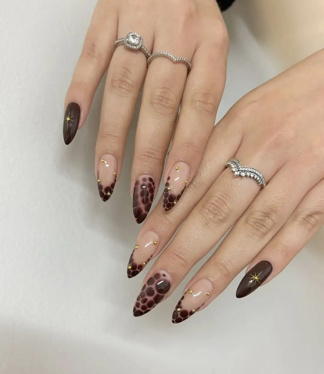 fall nail trends 2026 Mocha Crocodile Print Nails with Luxe Gold Accents