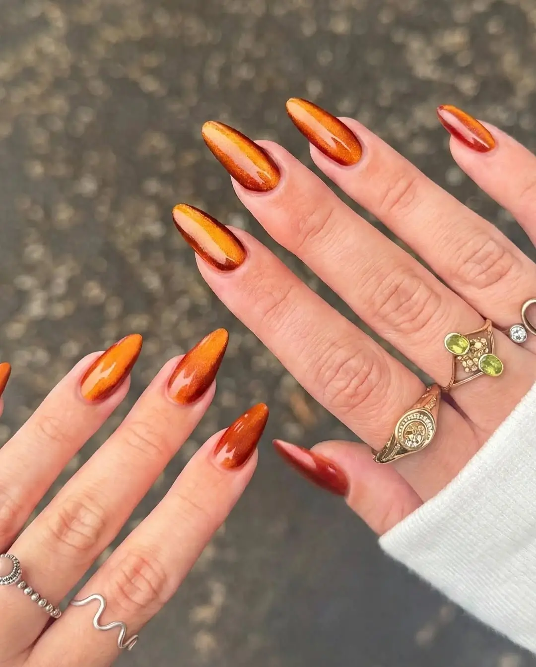 fall nail trends 2026 Burnt Copper Cat Eye Nails That Glow Like Autumn Leaves