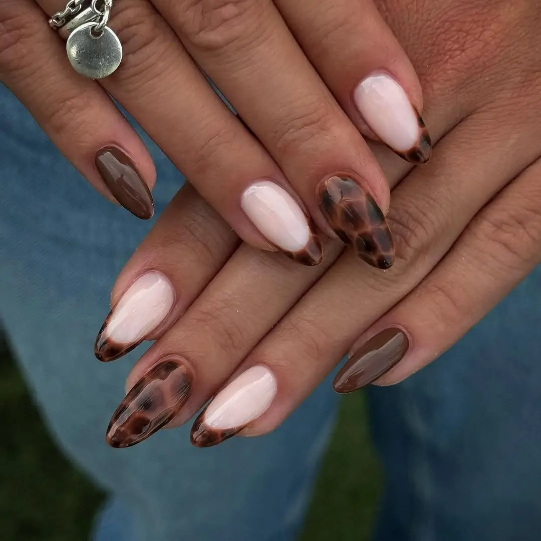 fall nail trends 2026 Glossy Tortoiseshell French Nails with Rich Chocolate Accents