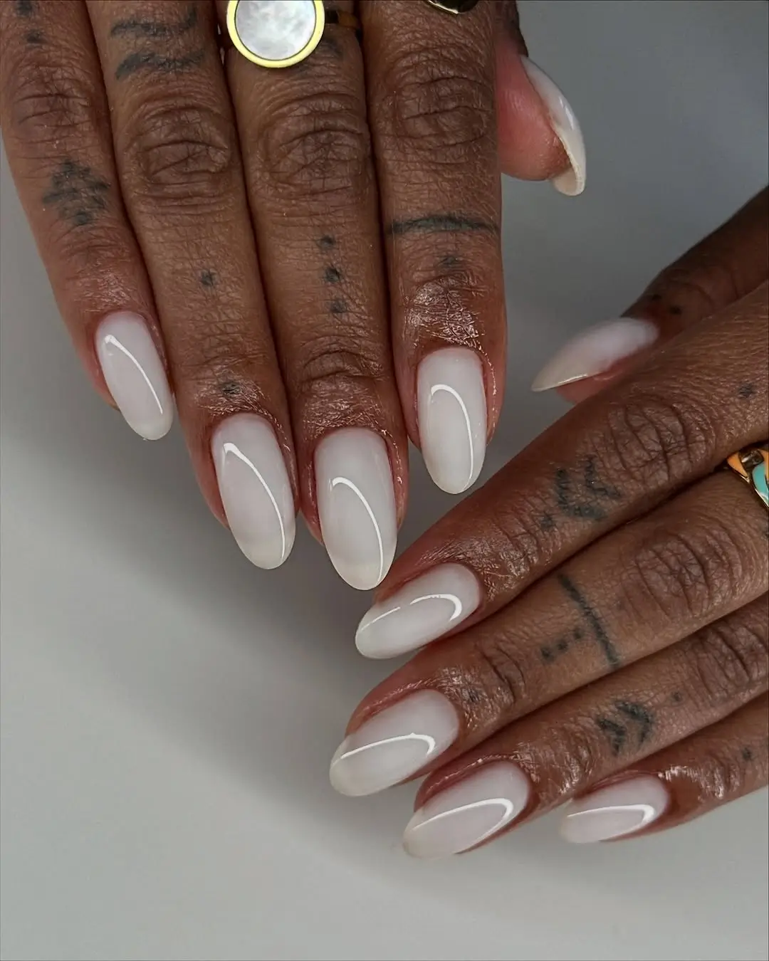 Fall nails colors for dark skinned hands with milky white almond nails