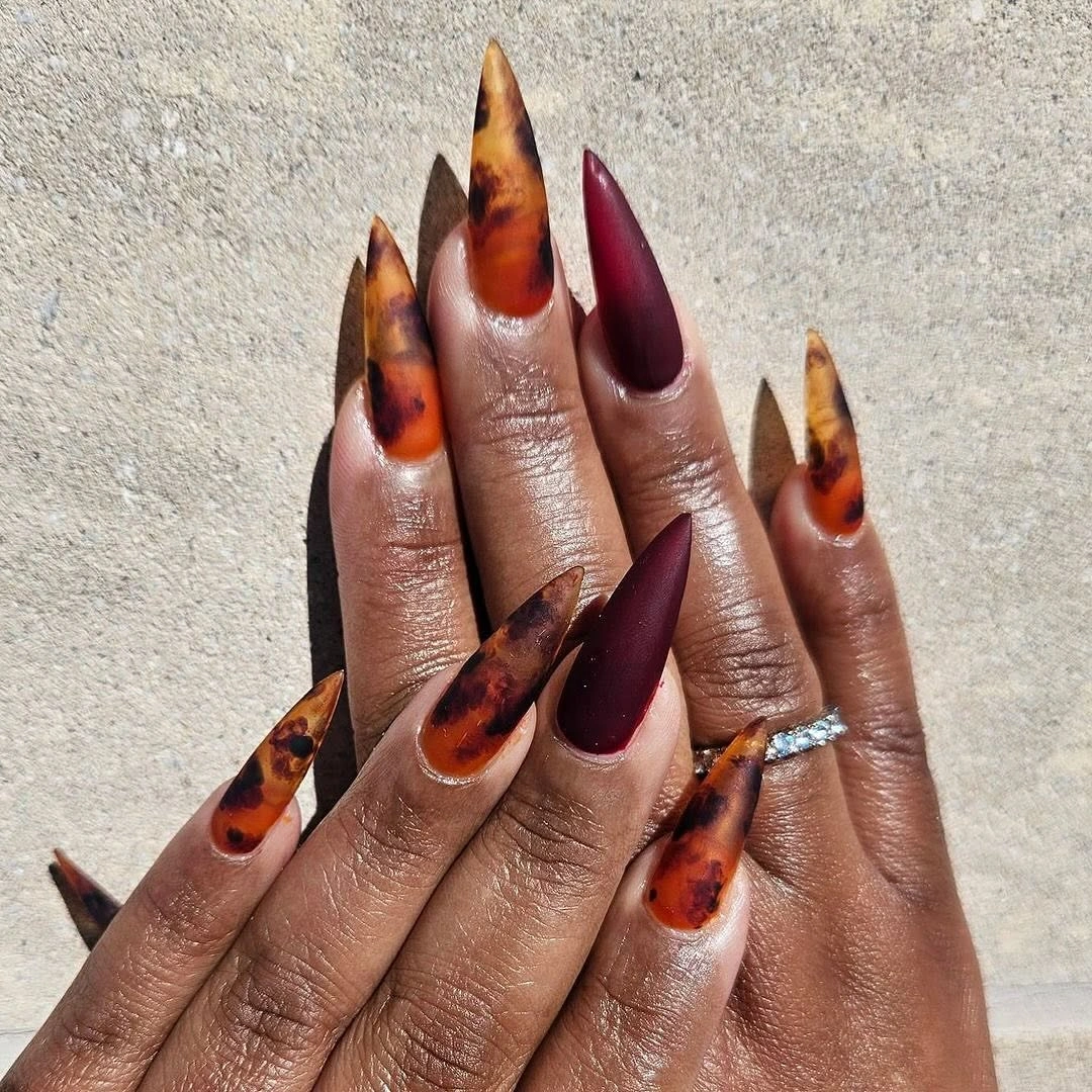 fall nails for brown skin tone Tortoiseshell And Deep Berry Stiletto Nails For Autumn