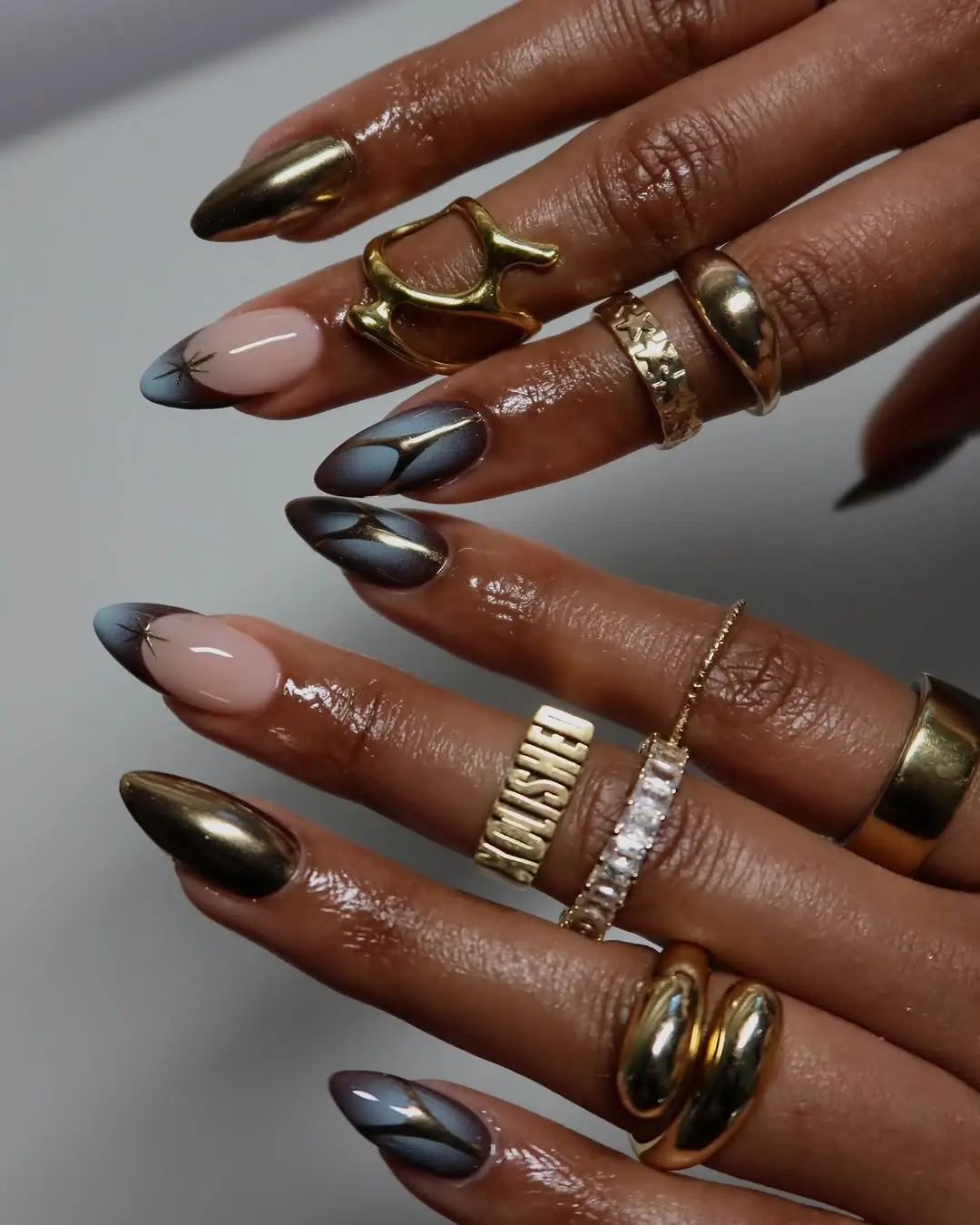Fall nails for dark skin 2026 Smoky Chrome Nails With Luxe Gold Details