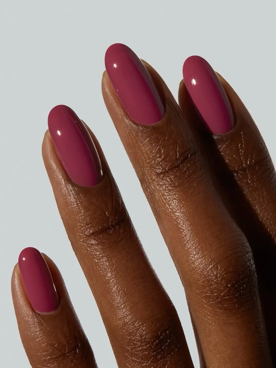Fall nails for dark skin 2026 Glossy Berry Pink Nails That Feel Like Early Fall