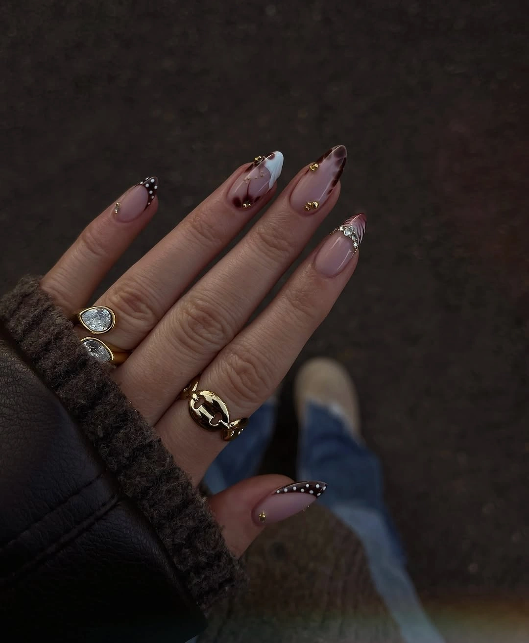 sheer plum almond fall nails for fair skin tone with gold details