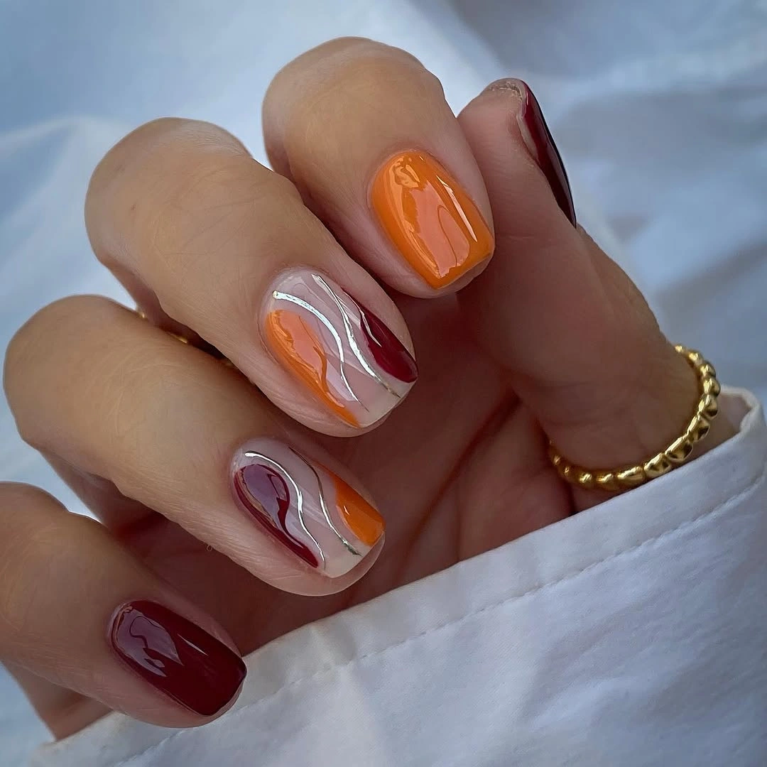 fall nails for fair skin tone Autumn Orange and Burgundy Waves on Short Nails