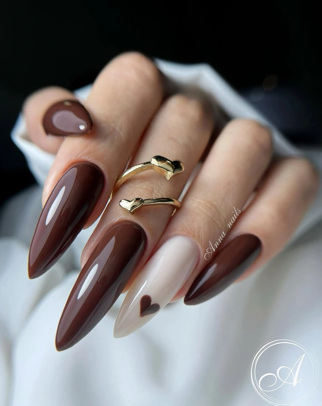 fall nails for tan skin tone deep brown almond nails with heart accent