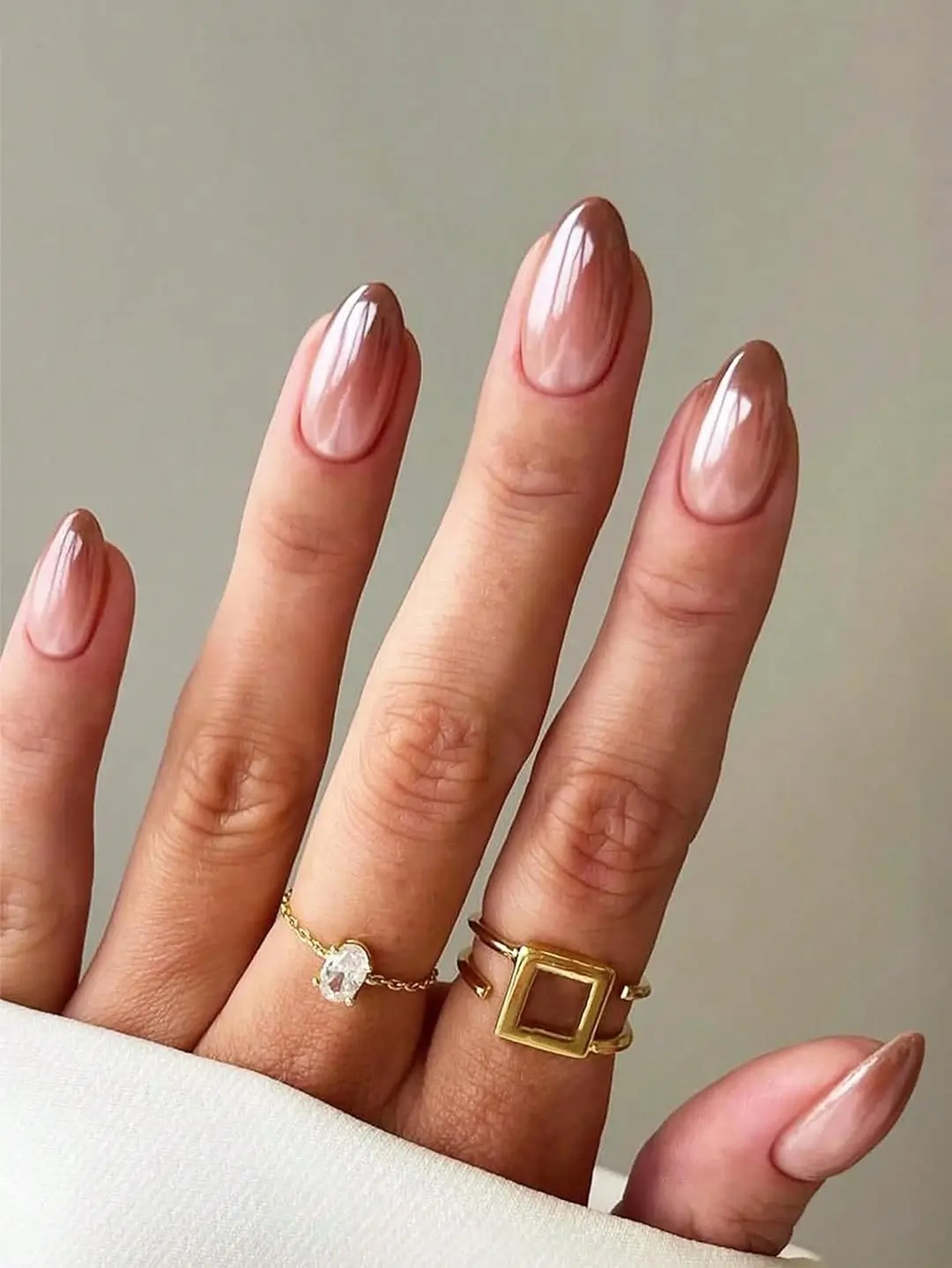 Fall short almond nails 2026 Glossy Mocha Glazed Nails with Soft Chrome Depth