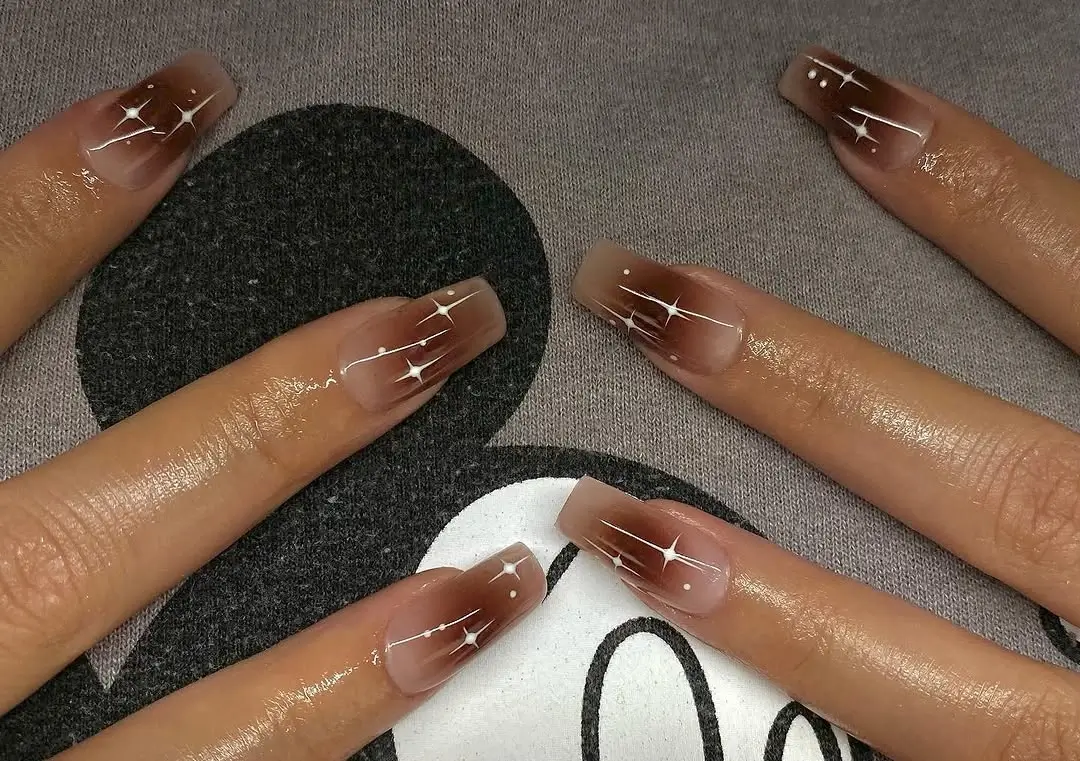 fall short coffin nails designs Chocolate Nude Coffin Nails With Tiny Starburst Details