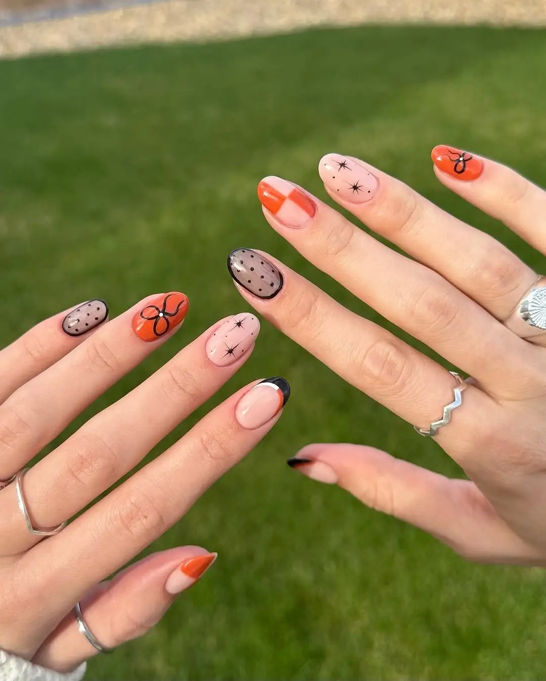 fall short coffin nails designs Playful Orange and Black Short Nails With Retro Autumn Details