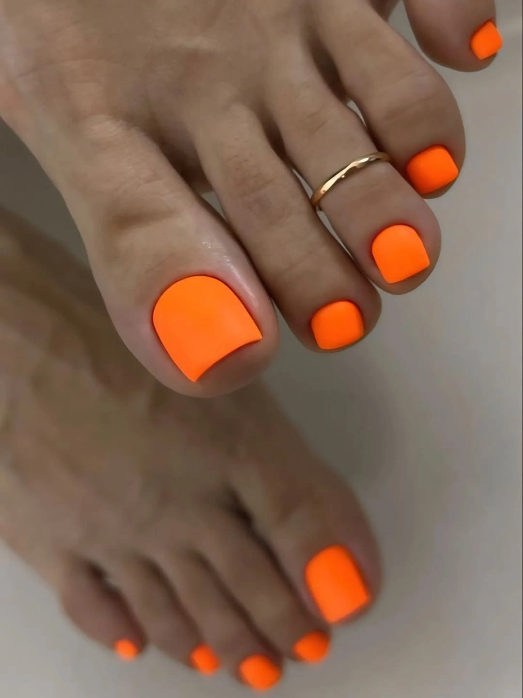 fall toe nails colors 2026 Electric Orange for a Bold Early Fall Accent