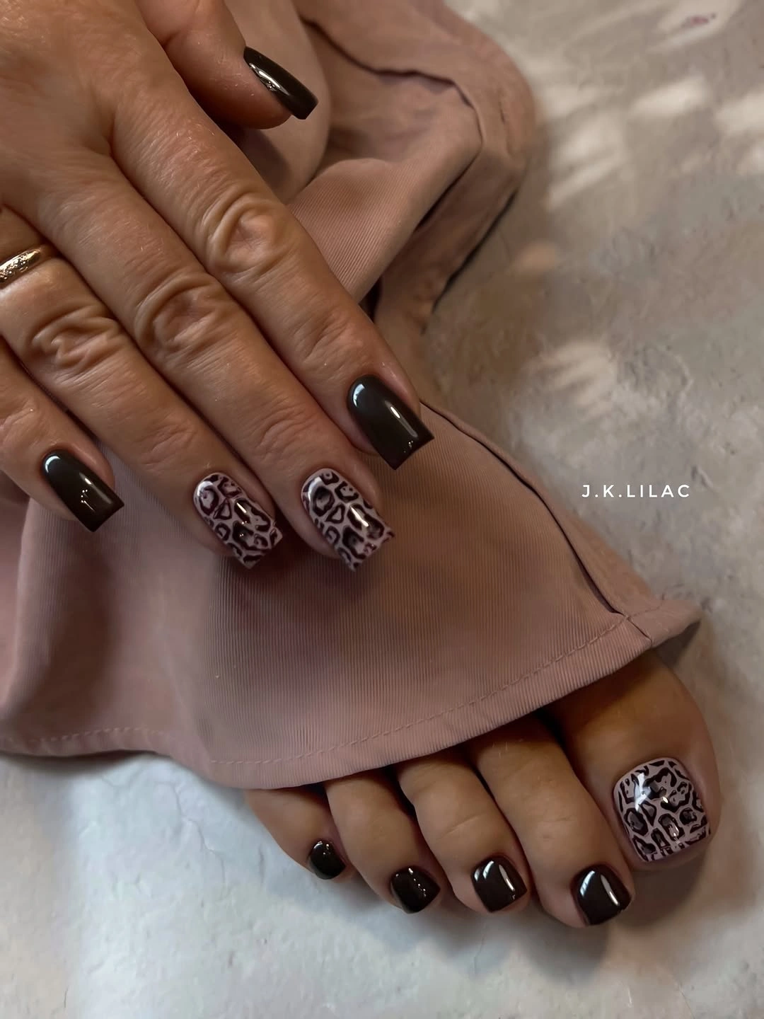 fall toe nails colors 2026 Dark Brown Leopard Pedicure for an Editorial Touch