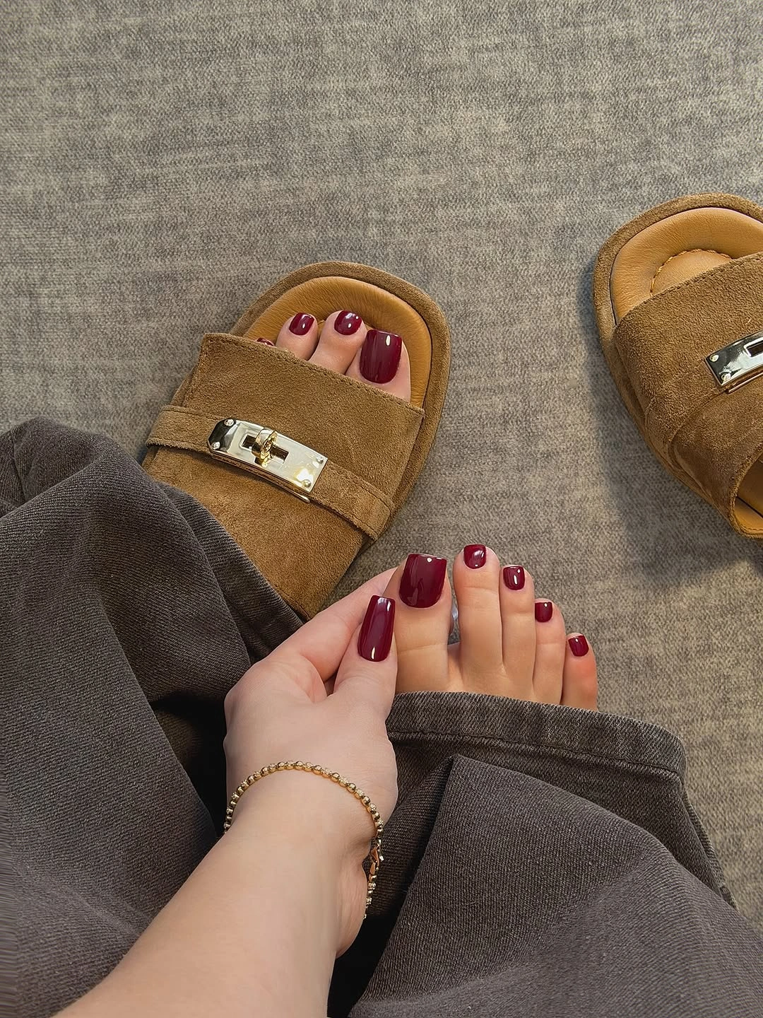 fall toe nails colors 2026 Burgundy Pedicure Styled with Cozy Fall Accessories