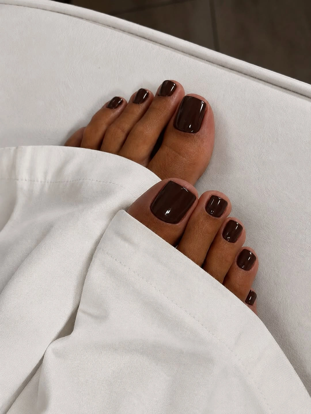 fall toe nails colors 2026 Deep Espresso Brown on Warm Brown Skin