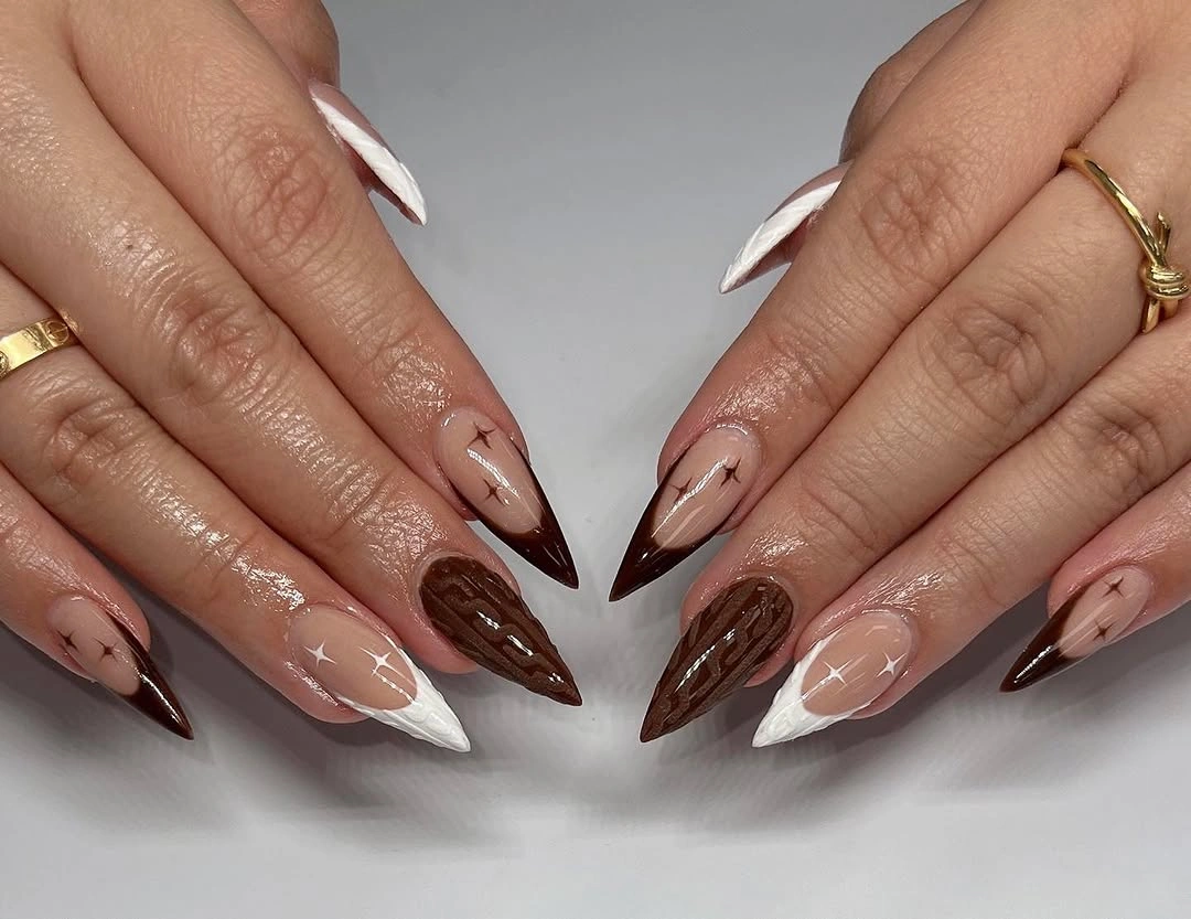 fall trendy nails 2026 chocolate cream almond nails with star details