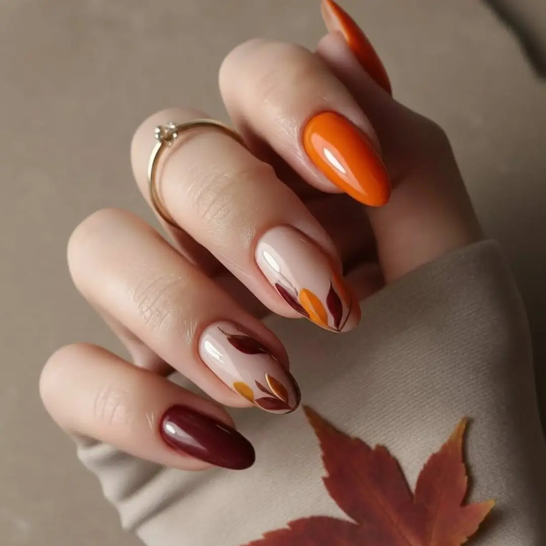 Fall wedding nails 2026 Autumn Leaf Nail Art with Burnt Orange Accents