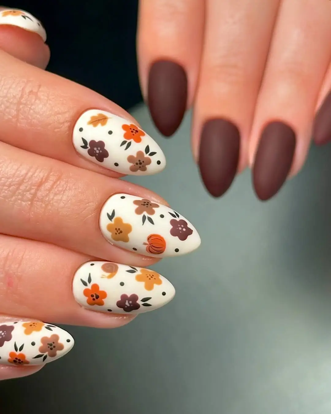 Fall wedding nails 2026 Matte Chocolate Floral Nails with Autumn Charm