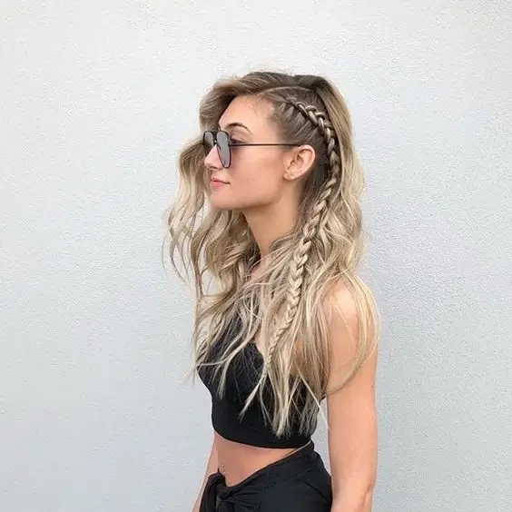 middle parting hairstyles Blonde Waves With a Delicate Side Braid