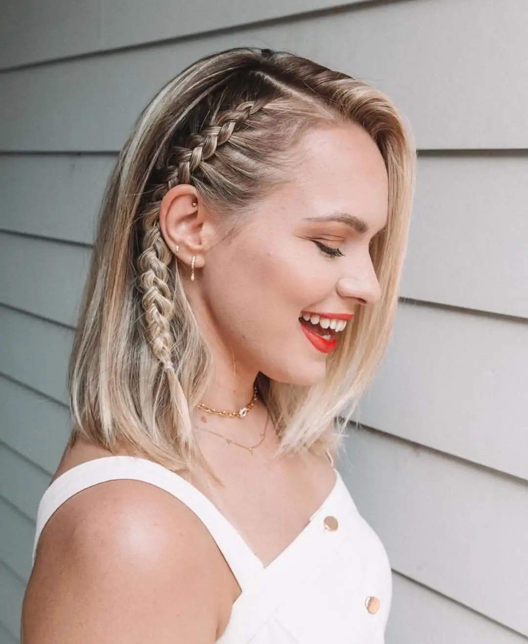 middle parting hairstyles Blonde Side Braid With Relaxed Waves