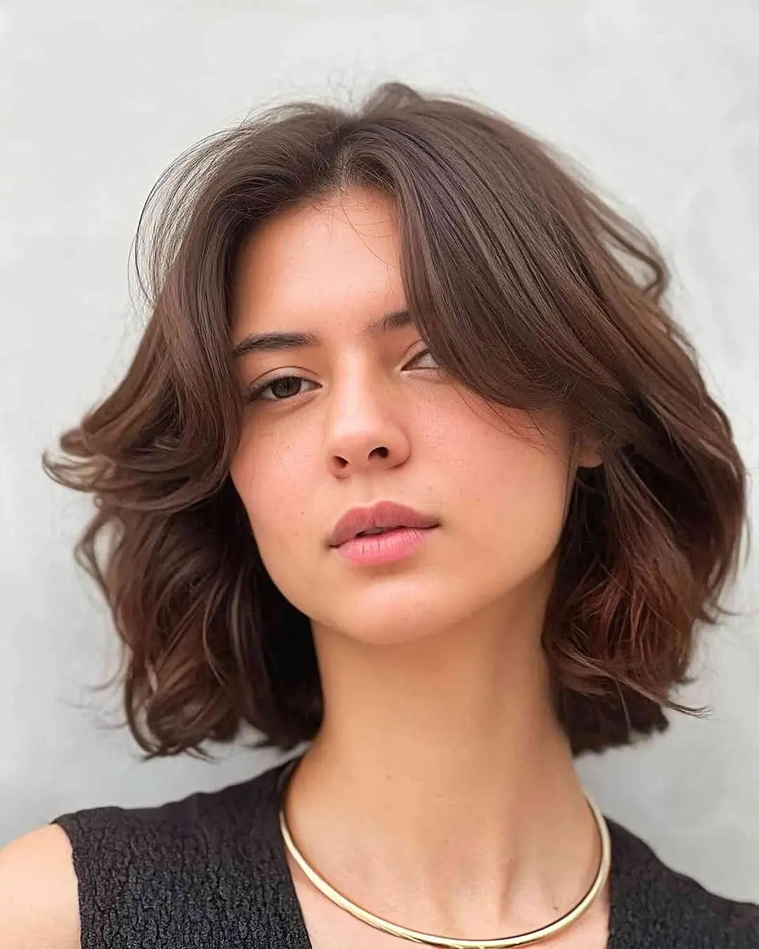 middle parting hairstyles Short Brown Waves With Face-Framing Volume
