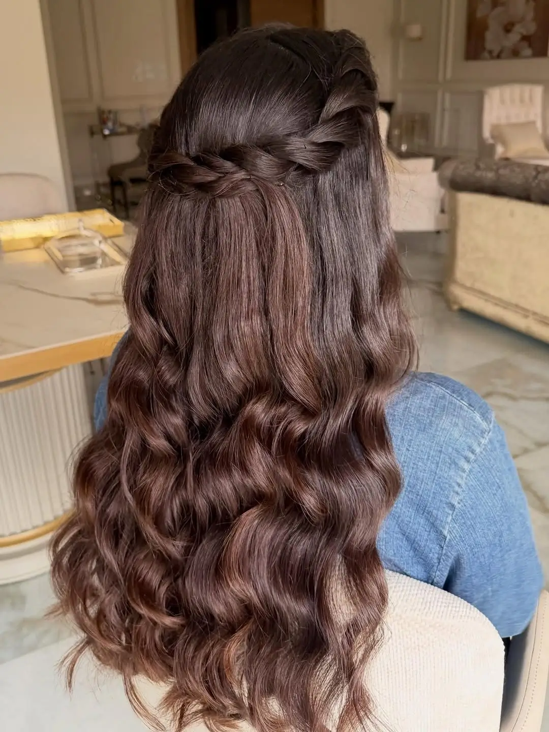 middle parting hairstyles Romantic Brown Waves With a Braided Half-Up Detail