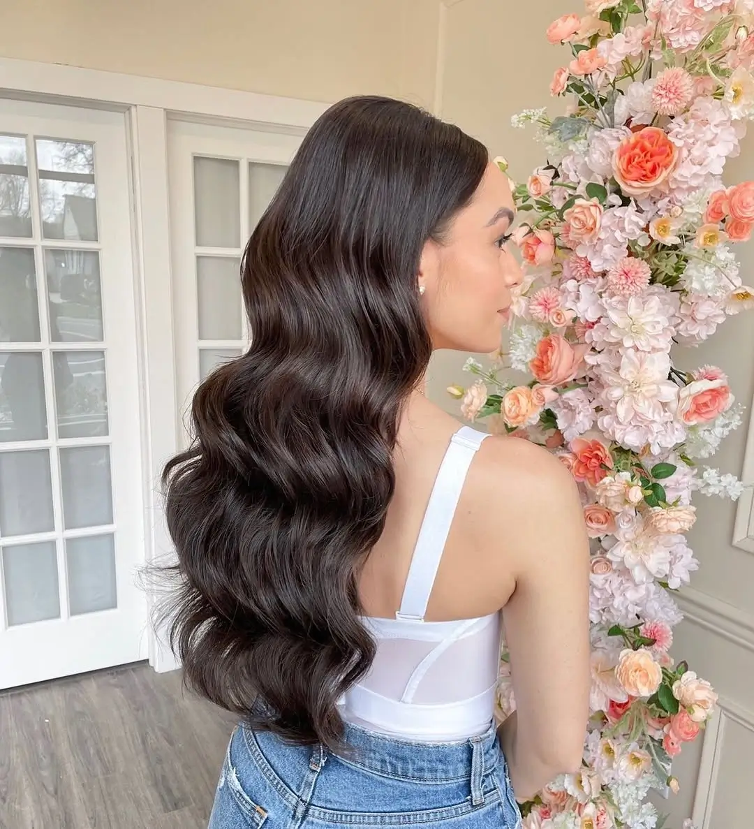 middle parting hairstyles Glossy Long Waves for an Elegant Feminine Look