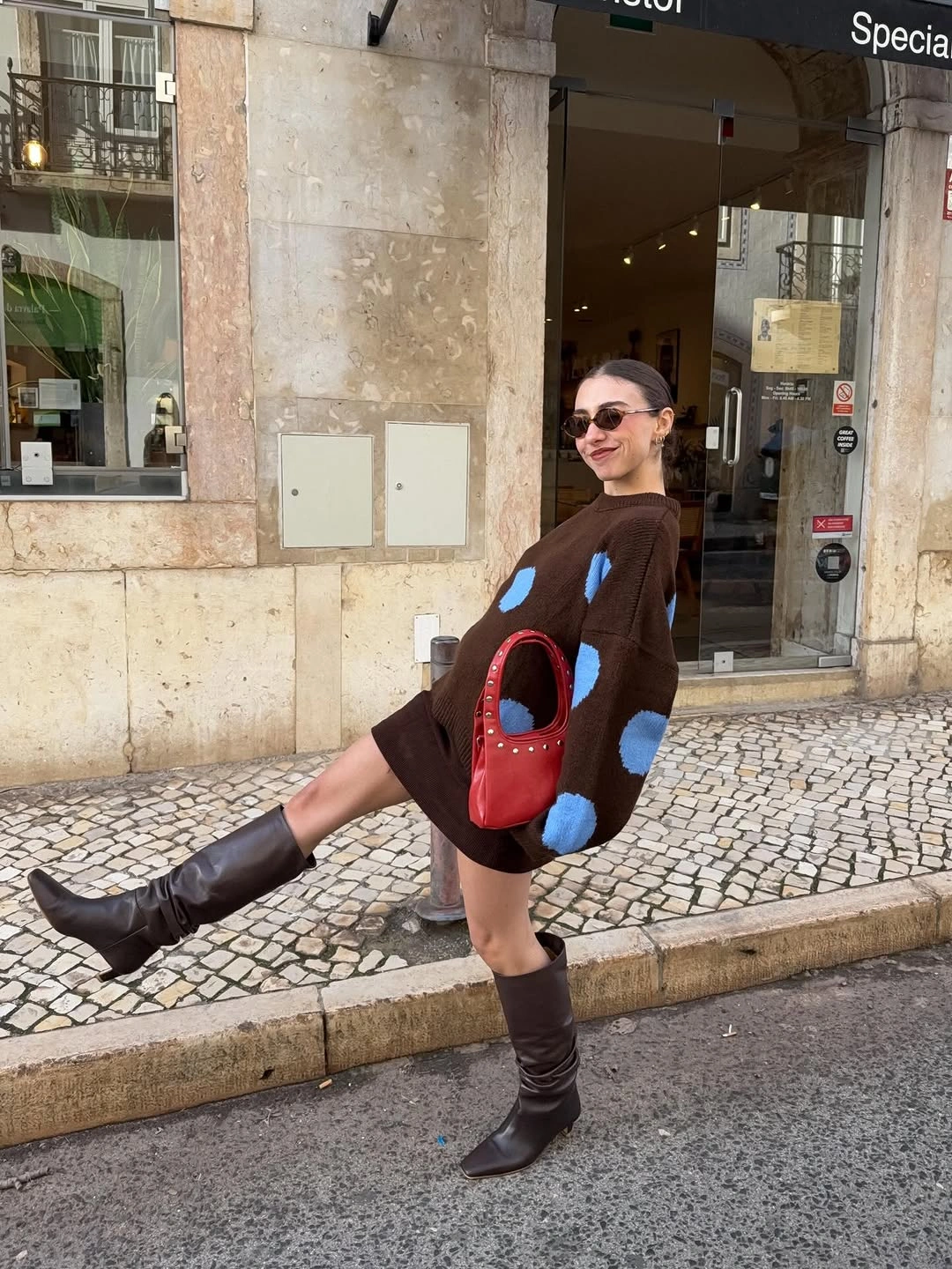 September fashion trends 2026 brown sweater blue pattern and tall boots