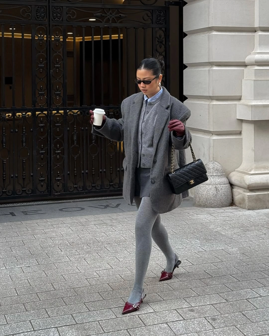 September fashion trends 2026 gray layers with burgundy shoes