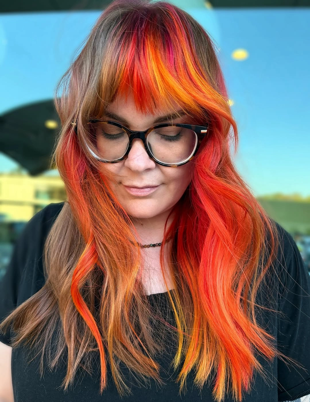 September hair Colour trends 2026 fiery copper with orange and red ribbon highlights