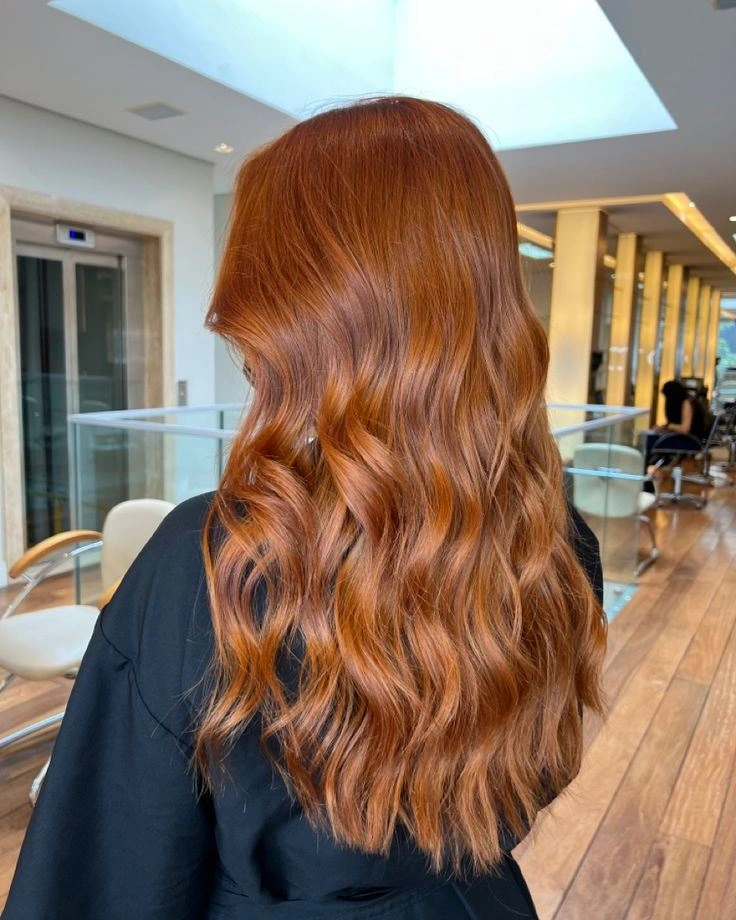 September hair Colour trends 2026 warm copper waves with a soft natural finish