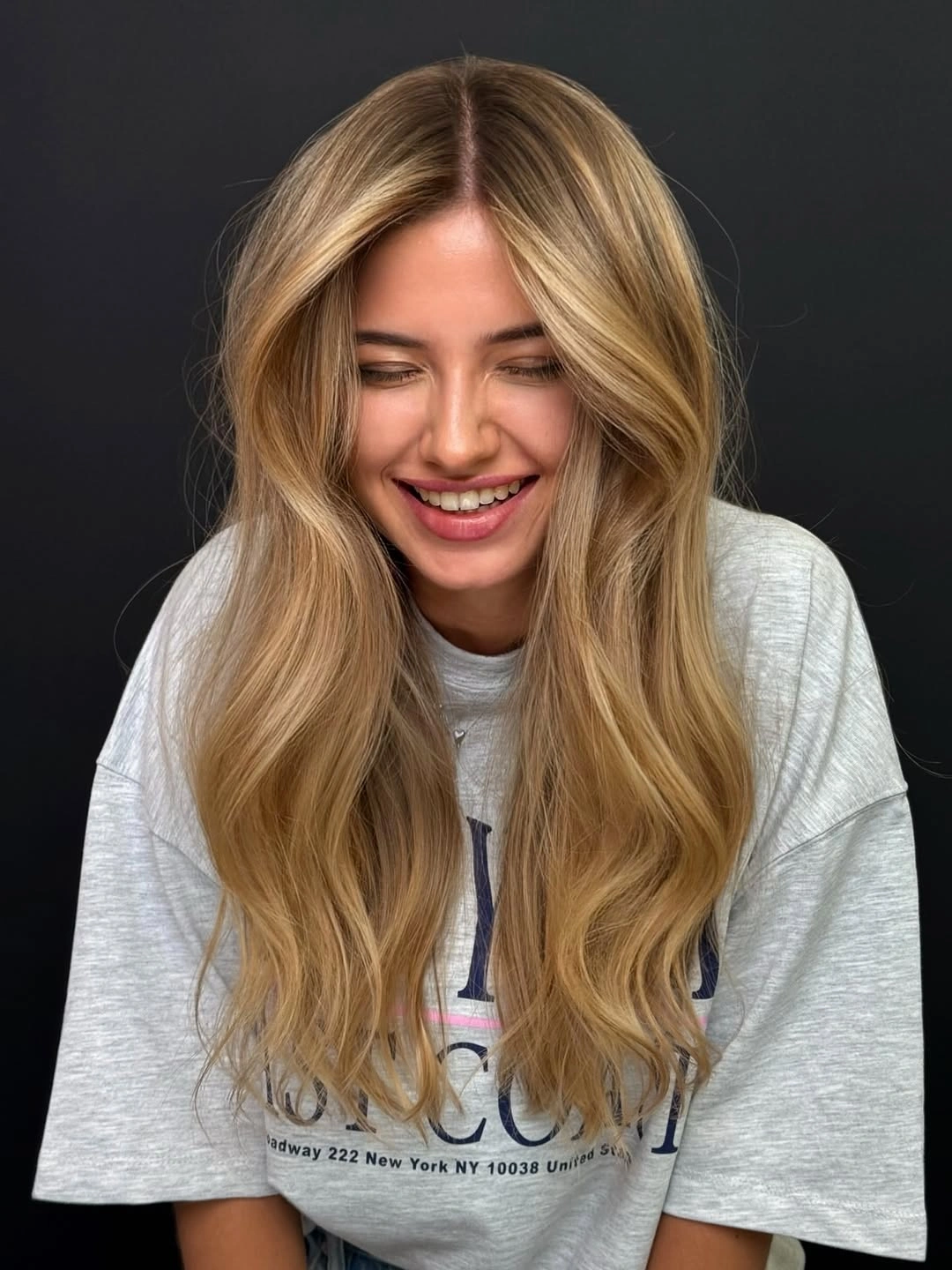 September hair Colour trends 2026 soft golden blonde with long face framing layers