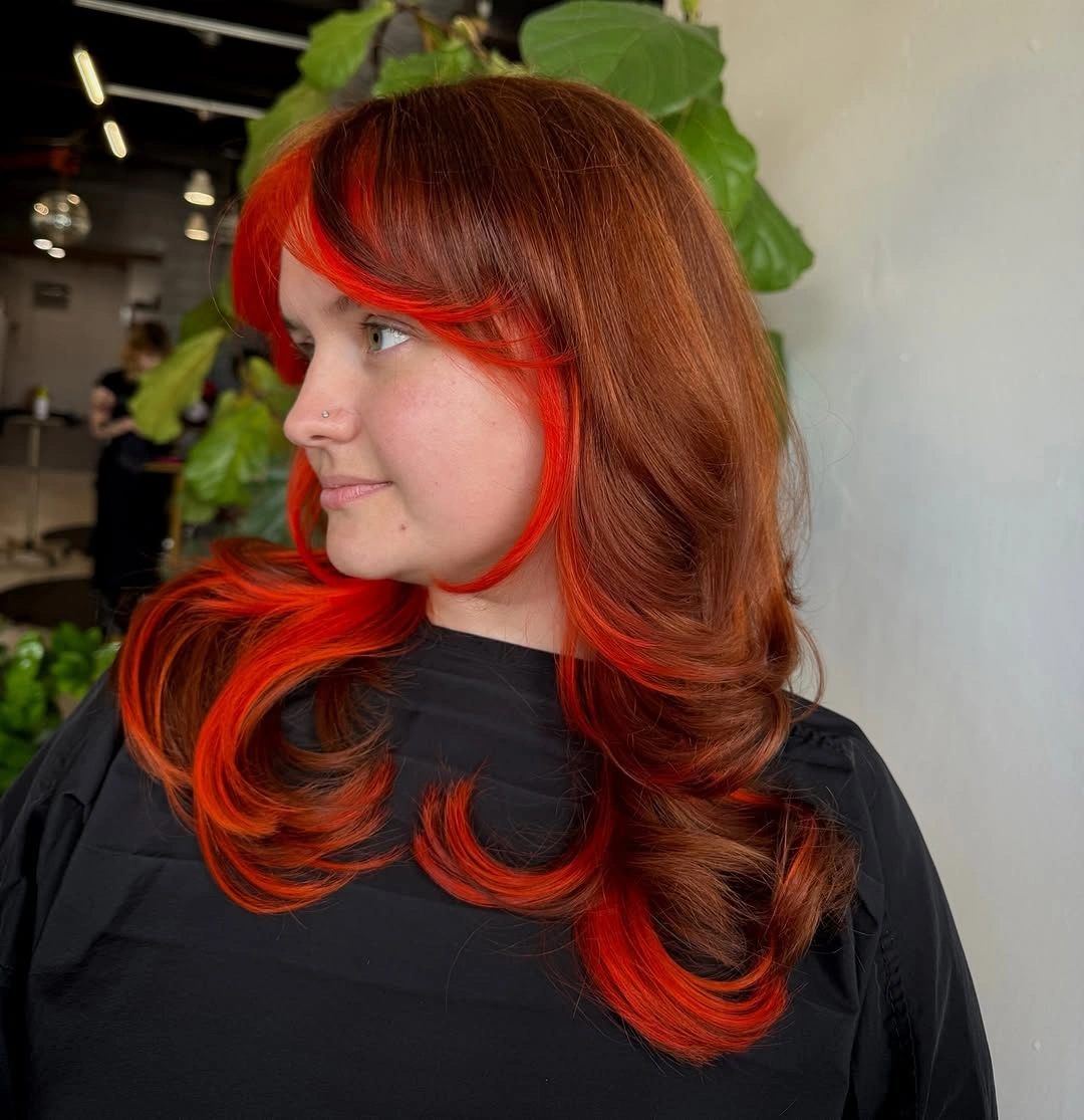 September hair Colour trends 2026 chocolate brown with fiery red face framing