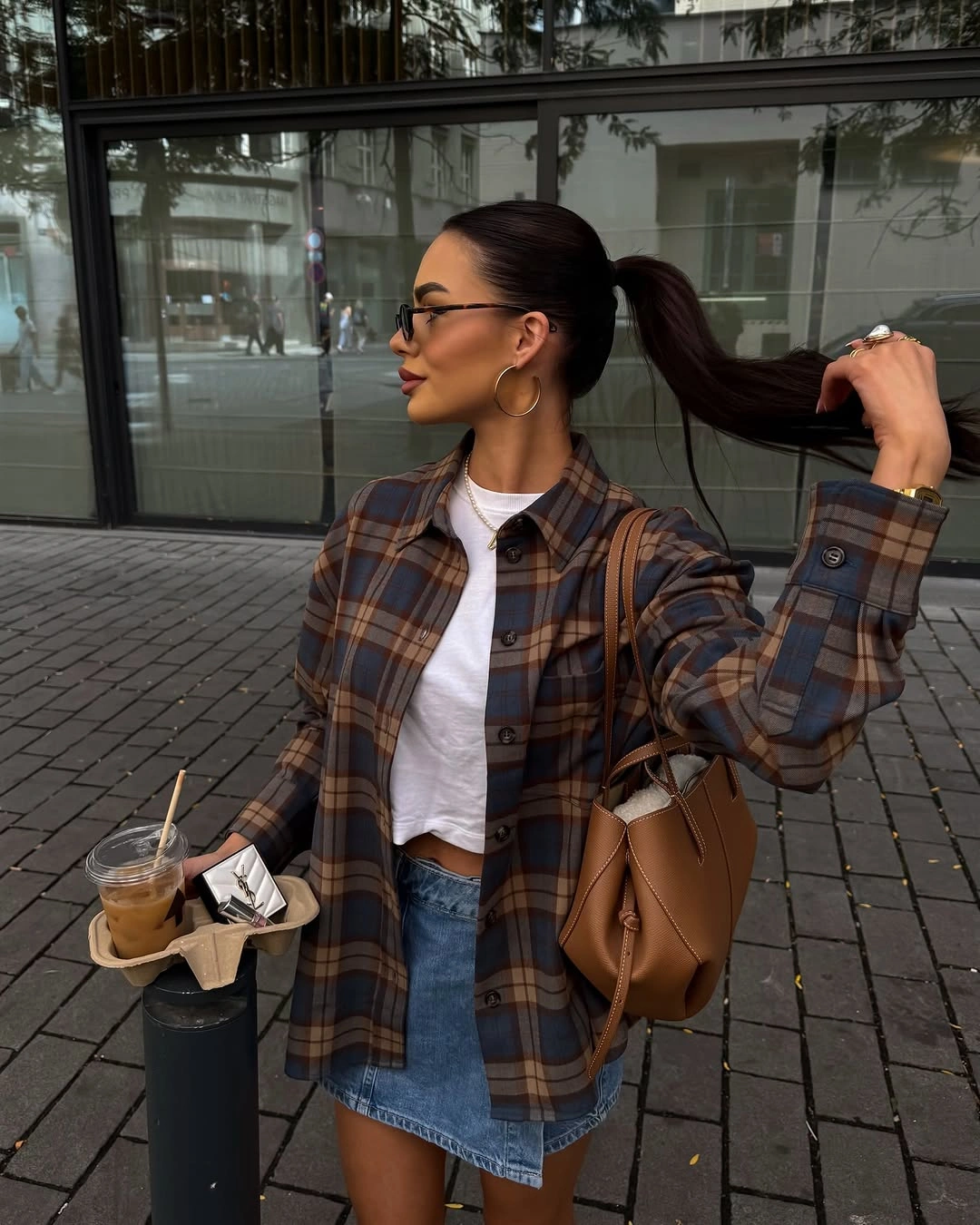 September outfit ideas 2026 brown plaid shirt jacket and denim mini for warm September days